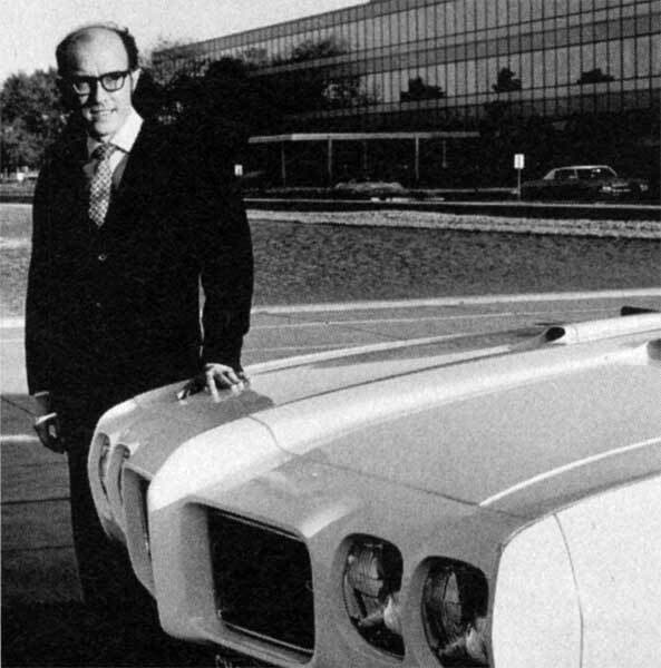 Bill Porter standing next to a 1970s GTO model GM Archives 2 Bill Porter standing next to a 1970s GTO model GM Archives 2