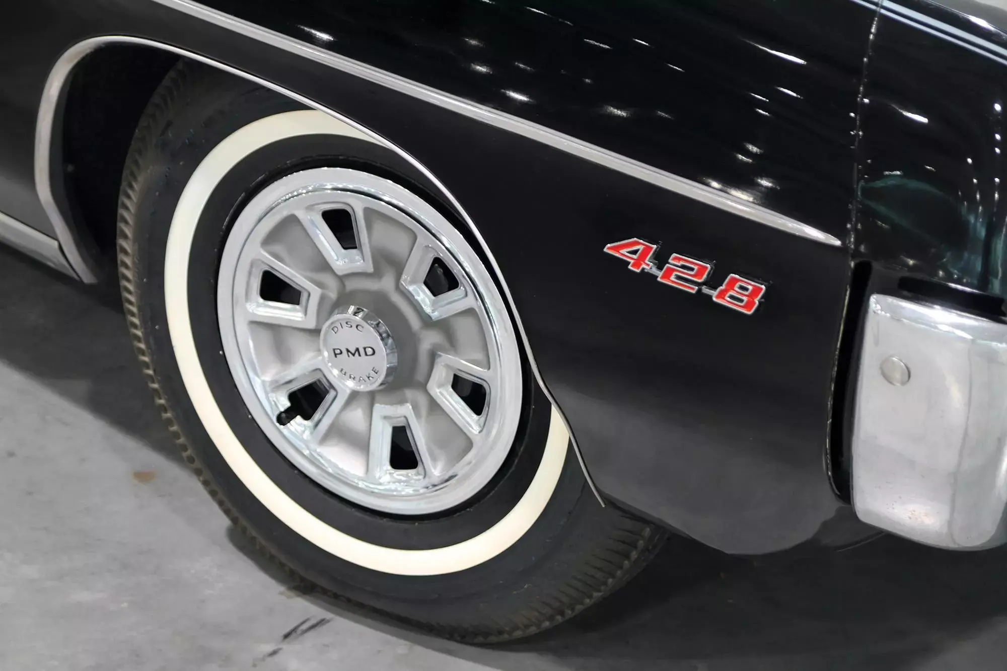 Color closeup of a wheel and tire on a 1967 pontiac catalina 2 2 jpg
